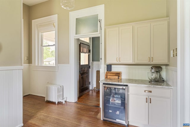 2024 Rivermont Ave, Lynchburg, VA 24503 - bar area with wine cooler, radiator heating unit, wainscoting, and dark wood-style flooring