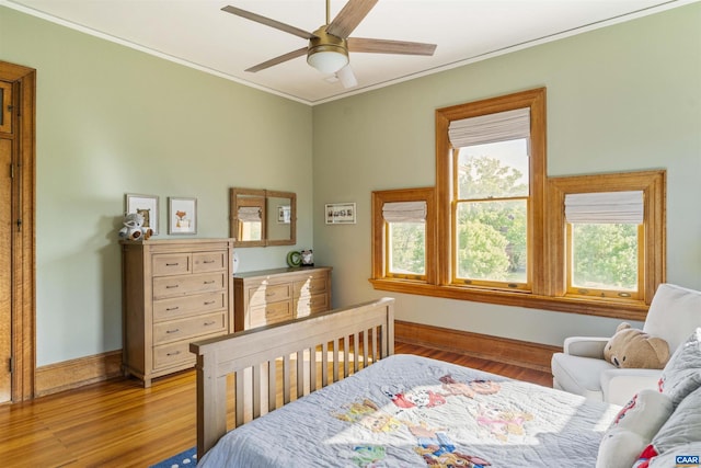 2024 Rivermont Ave, Lynchburg, VA 24503 - bedroom with multiple windows, crown molding, wood finished floors, and ceiling fan