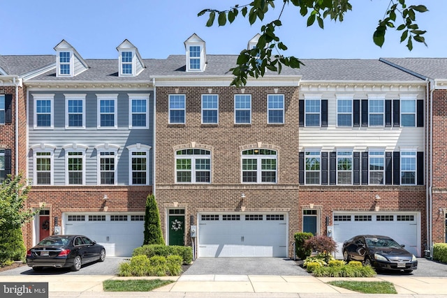 6006 Charles Xing, Ellicott City, MD 21043 - view of front facade with a garage, driveway, and brick siding