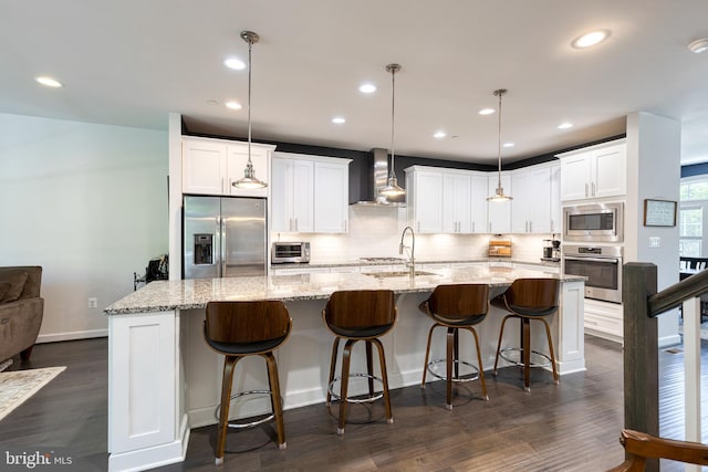 6006 Charles Xing, Ellicott City, MD 21043 - kitchen with appliances with stainless steel finishes, wall chimney range hood, dark wood-style flooring, backsplash, and recessed lighting