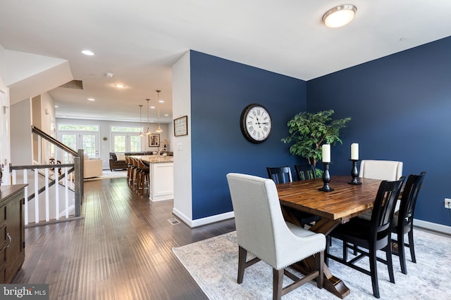 6006 Charles Xing, Ellicott City, MD 21043 - dining space featuring dark wood finished floors, recessed lighting, and stairway