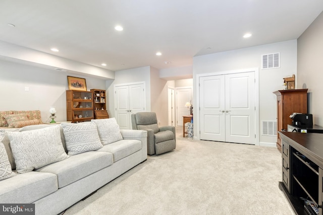 6006 Charles Xing, Ellicott City, MD 21043 - living area featuring light colored carpet and recessed lighting