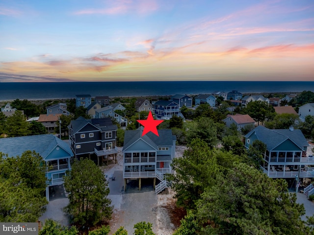 1510 N Bay Shore Dr, Milton, DE 19968 - aerial view at dusk of a water view and a residential view