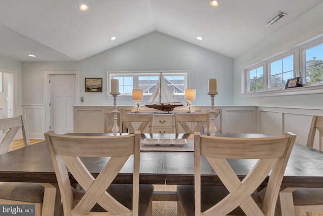1510 N Bay Shore Dr, Milton, DE 19968 - dining room with a wainscoted wall, a decorative wall, and lofted ceiling