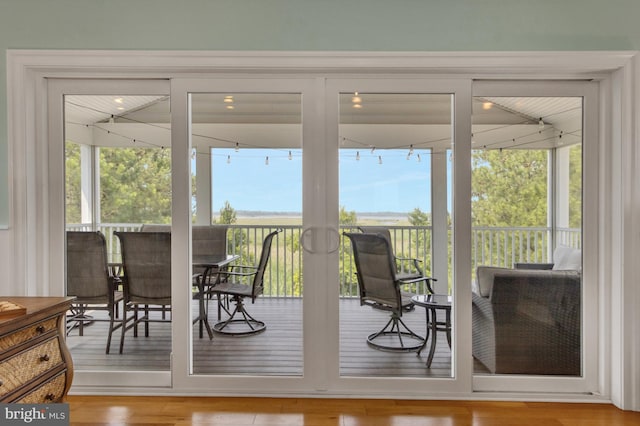 1510 N Bay Shore Dr, Milton, DE 19968 - sunroom with a deck and wood finished floors