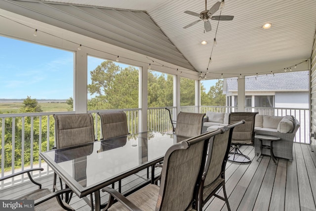 1510 N Bay Shore Dr, Milton, DE 19968 - sunroom / solarium with lofted ceiling, ceiling fan, outdoor dining space, and plenty of natural light