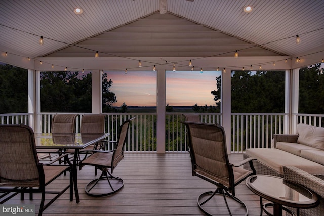 1510 N Bay Shore Dr, Milton, DE 19968 - deck at dusk with outdoor dining area