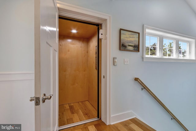 1510 N Bay Shore Dr, Milton, DE 19968 - corridor with light wood-style floors and an upstairs landing