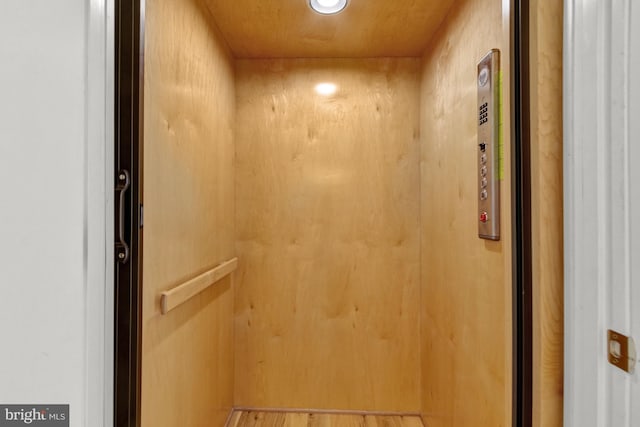1510 N Bay Shore Dr, Milton, DE 19968 - elevator with wood finished floors