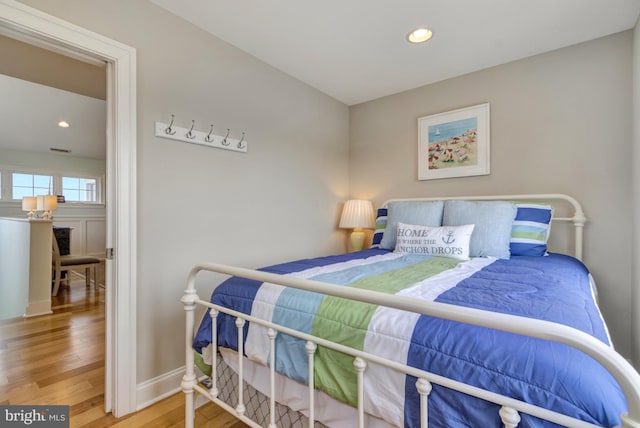 1510 N Bay Shore Dr, Milton, DE 19968 - bedroom featuring wood finished floors and recessed lighting