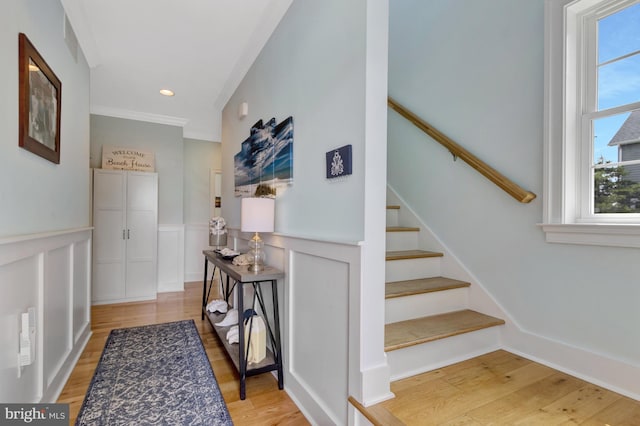 1510 N Bay Shore Dr, Milton, DE 19968 - entrance foyer with light wood-style flooring, stairway, recessed lighting, wainscoting, and ornamental molding