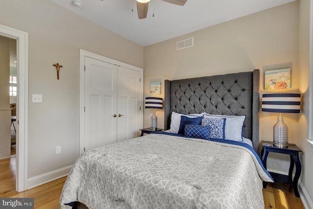 1510 N Bay Shore Dr, Milton, DE 19968 - bedroom with light wood finished floors, a closet, and ceiling fan