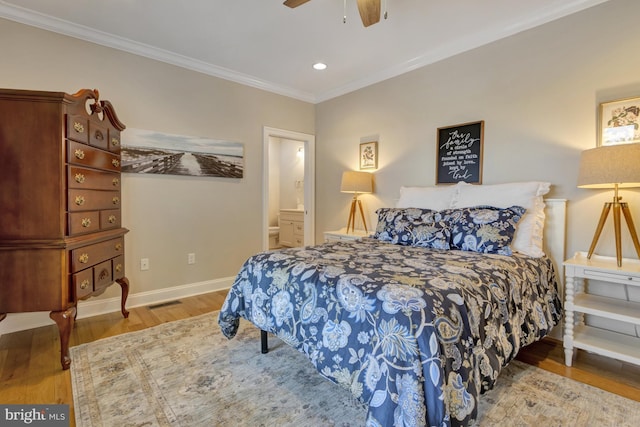 1510 N Bay Shore Dr, Milton, DE 19968 - bedroom featuring wood finished floors, recessed lighting, crown molding, a ceiling fan, and ensuite bath