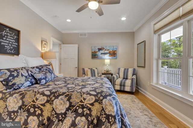 1510 N Bay Shore Dr, Milton, DE 19968 - bedroom with wood finished floors, ornamental molding, recessed lighting, and a ceiling fan