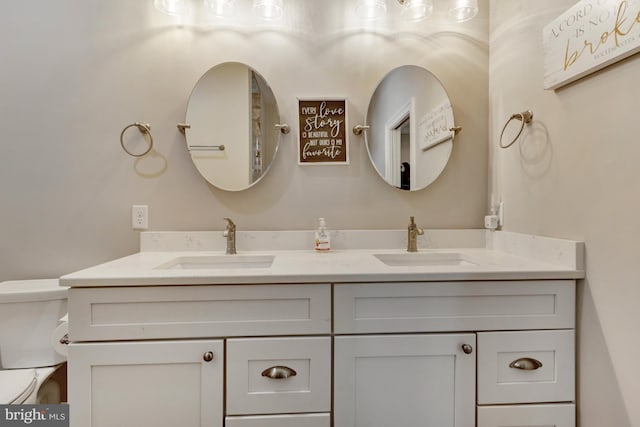 1510 N Bay Shore Dr, Milton, DE 19968 - bathroom with double vanity and toilet