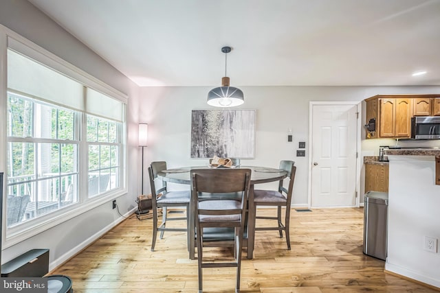 16206 Tiffany Ln, Haymarket, VA 20169 - dining room with light wood-style floors