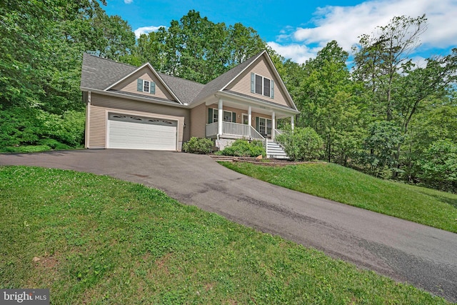 16206 Tiffany Ln, Haymarket, VA 20169 - view of front of house with covered porch, driveway, an attached garage, a front lawn, and a shingled roof