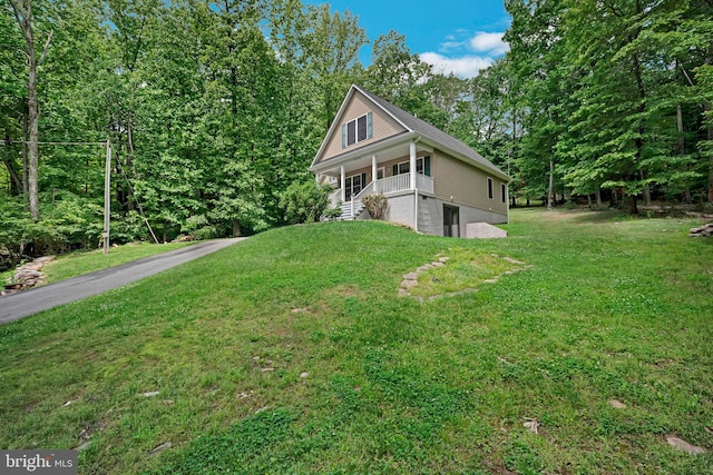 16206 Tiffany Ln, Haymarket, VA 20169 - view of front of home featuring covered porch, a front yard, and stairway