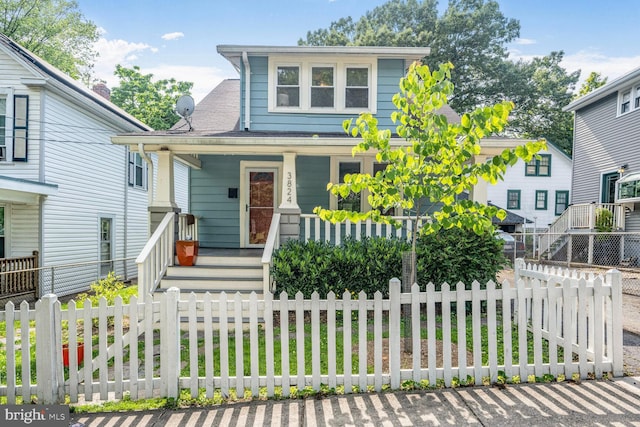3824 31st St, Mount Rainier, MD 20712 - view of front of property featuring a porch and a fenced front yard
