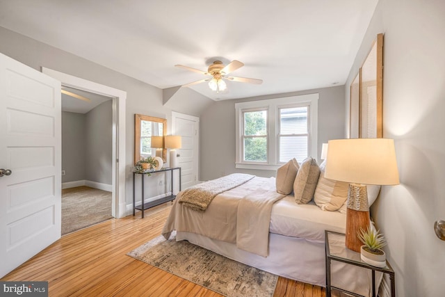 3824 31st St, Mount Rainier, MD 20712 - bedroom with multiple windows, wood finished floors, and ceiling fan
