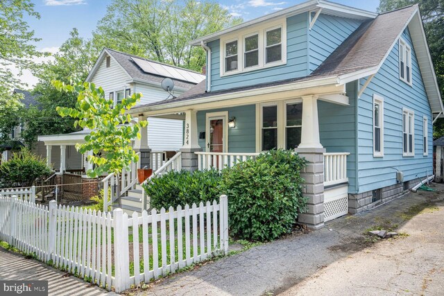 3824 31st St, Mount Rainier, MD 20712 - view of front of house with a porch and roof with shingles
