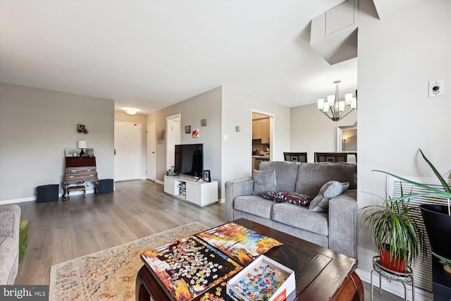 7420 Westlake Ter Unit 801, Bethesda, MD 20817 - living room featuring a chandelier and light wood-style floors