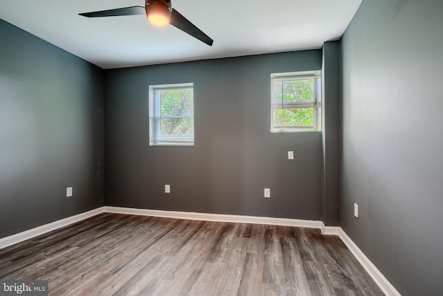 2557 W Baltimore St, Baltimore, MD 21223 - spare room with wood finished floors and a ceiling fan