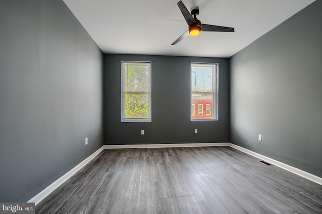 2557 W Baltimore St, Baltimore, MD 21223 - spare room featuring wood finished floors and ceiling fan
