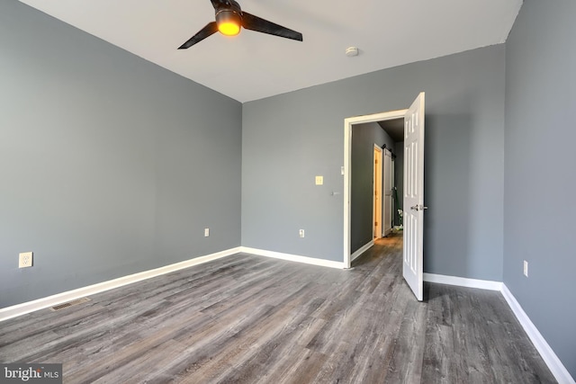2557 W Baltimore St, Baltimore, MD 21223 - unfurnished room with ceiling fan, wood finished floors, and a smoke detector