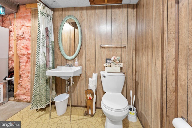 405 Confederate Blvd, Fredericksburg, VA 22401 - bathroom featuring toilet and wooden walls
