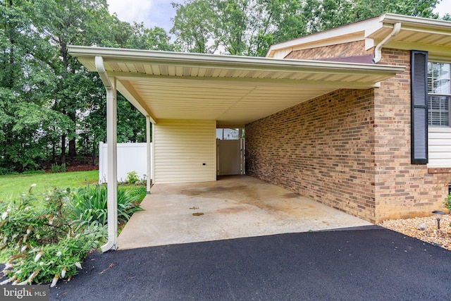405 Confederate Blvd, Fredericksburg, VA 22401 - view of car parking with asphalt driveway and a carport