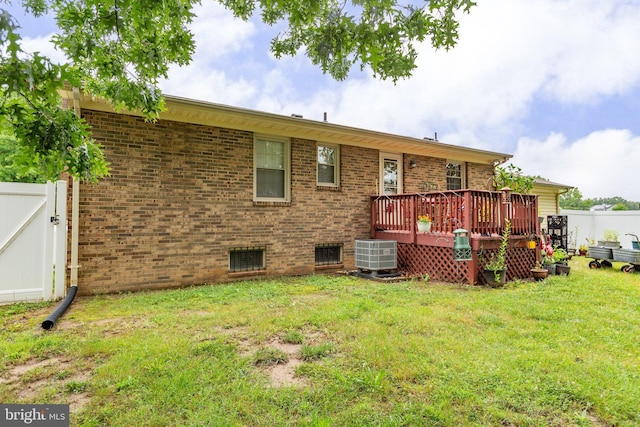 405 Confederate Blvd, Fredericksburg, VA 22401 - rear view of house with a wooden deck and brick siding