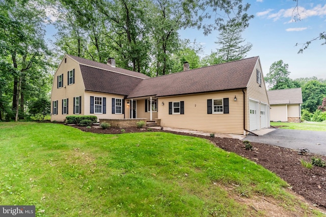 7 Forest Ln, Carlisle, PA 17015 - view of front of property featuring a chimney, a front yard, and roof with shingles