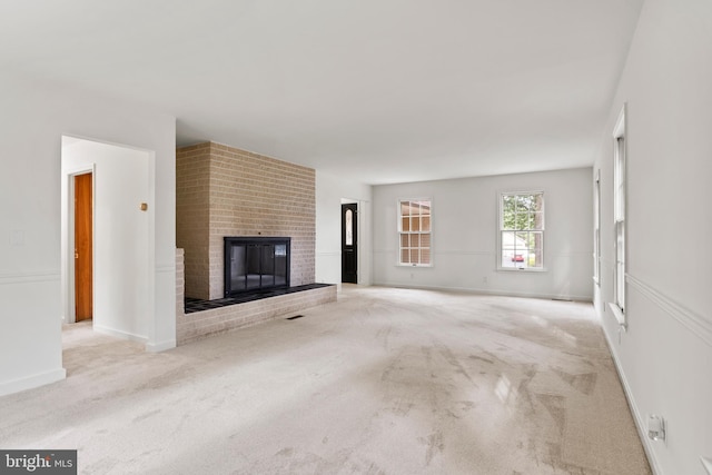 7 Forest Ln, Carlisle, PA 17015 - unfurnished living room featuring carpet floors and a brick fireplace