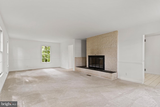 7 Forest Ln, Carlisle, PA 17015 - unfurnished living room with carpet flooring and a brick fireplace