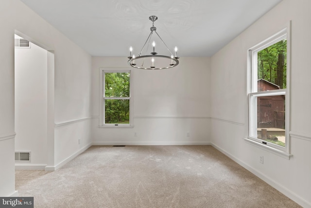 7 Forest Ln, Carlisle, PA 17015 - carpeted empty room featuring a chandelier and baseboards