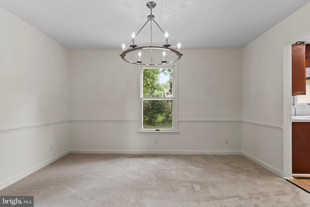 7 Forest Ln, Carlisle, PA 17015 - carpeted empty room featuring a chandelier and baseboards
