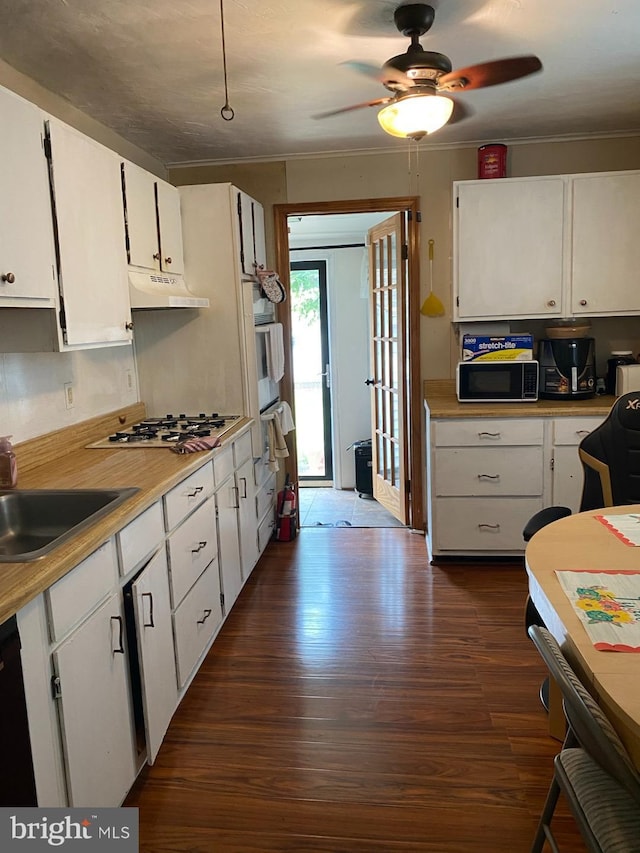 4 Highland Pl, Indian Head, MD 20640 - kitchen with black appliances, dark wood-style flooring, and white cabinets