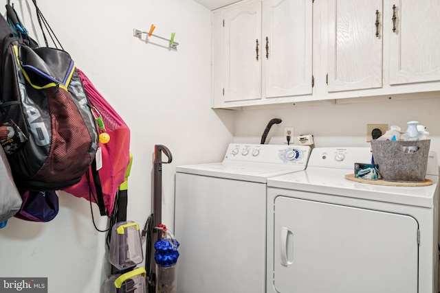 15301 Beaverbrook Ct Unit 92-3K, Silver Spring, MD 20906 - washroom with washing machine and dryer and cabinet space