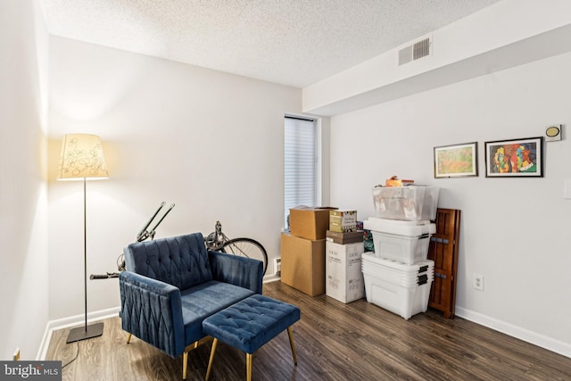 15301 Beaverbrook Ct Unit 92-3K, Silver Spring, MD 20906 - living area with dark wood-type flooring and a textured ceiling
