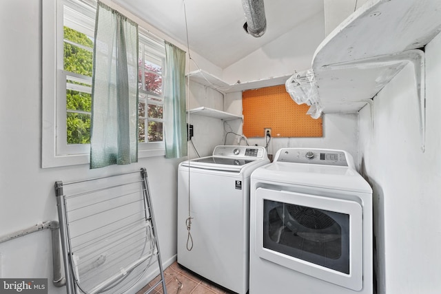 2818 Spiral Ln, Bowie, MD 20715 - washroom with washing machine and clothes dryer and tile patterned flooring