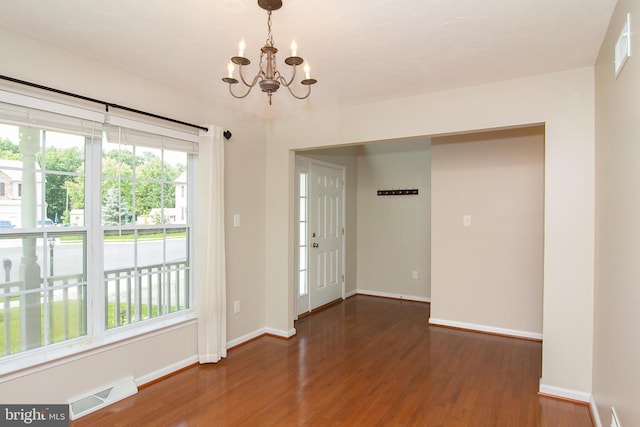 43 Oak Crest Ct, Hanover, PA 17331 - unfurnished room with a chandelier and wood finished floors