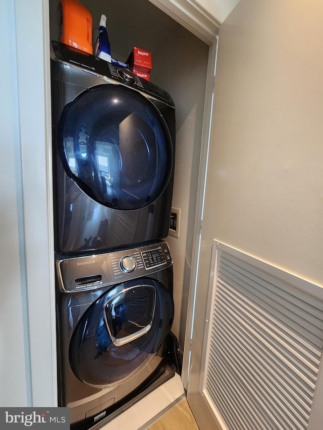 1650 Silver Hill Dr Unit 1608, Mclean, VA 22102 - washroom featuring estacked washer and dryer