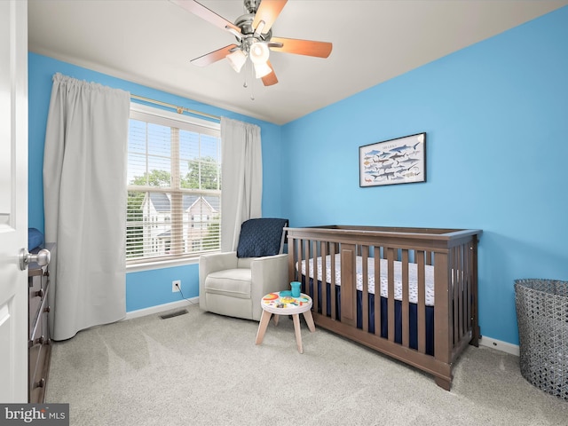 876 Nancy Lynn Ln, Arnold, MD 21012 - carpeted bedroom featuring a crib and ceiling fan
