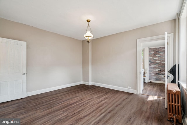 6022 Mccallum St, Philadelphia, PA 19144 - empty room with dark wood-style flooring and baseboards