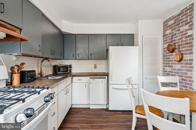 6022 Mccallum St, Philadelphia, PA 19144 - kitchen featuring white appliances, gray cabinets, dark wood-style floors, dark countertops, and decorative backsplash