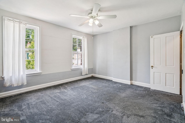 6022 Mccallum St, Philadelphia, PA 19144 - unfurnished room featuring dark carpet, healthy amount of natural light, and ceiling fan