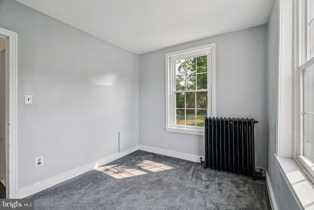 6022 Mccallum St, Philadelphia, PA 19144 - unfurnished room with radiator and dark colored carpet
