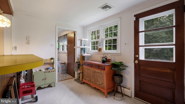 1226 Brownsville Rd, Feasterville Trevose, PA 19053 - entryway with baseboard heating and crown molding