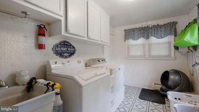 1226 Brownsville Rd, Feasterville Trevose, PA 19053 - laundry area featuring separate washer and dryer, cabinet space, and light tile patterned flooring